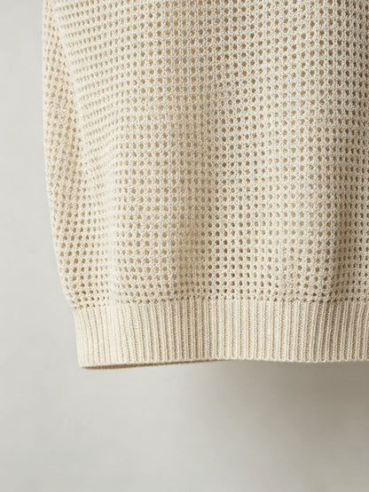Ärmelloses Herren-Poloshirt aus Strick mit Pointelle-Durchbruchmuster, Schwarz